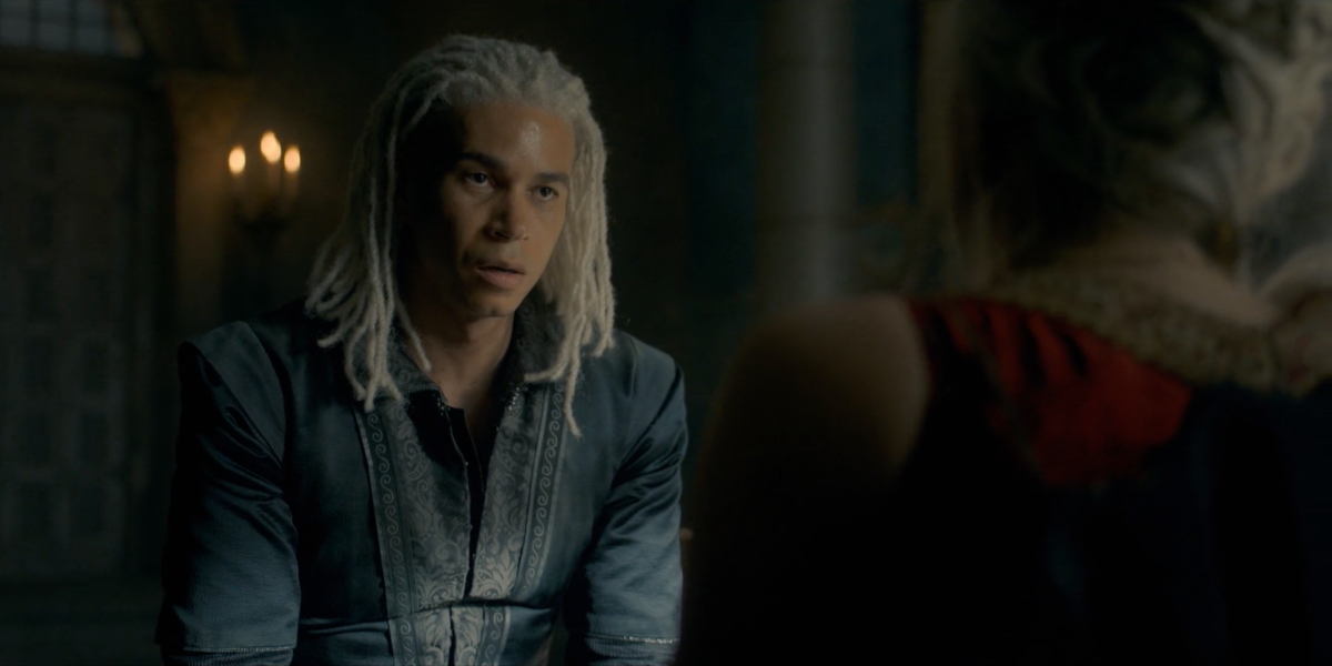 A close up of Laenor Velaryon looking sad
